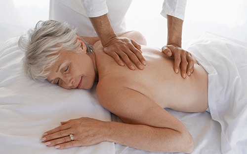 person receiving a Swedish massage to relieve arthritis pain and improve joint mobility