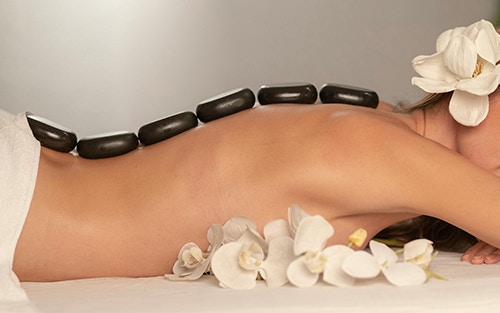 placement of hot stone in spa massage