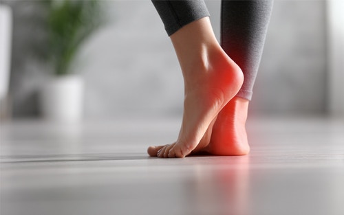 a person experiencing heel pain